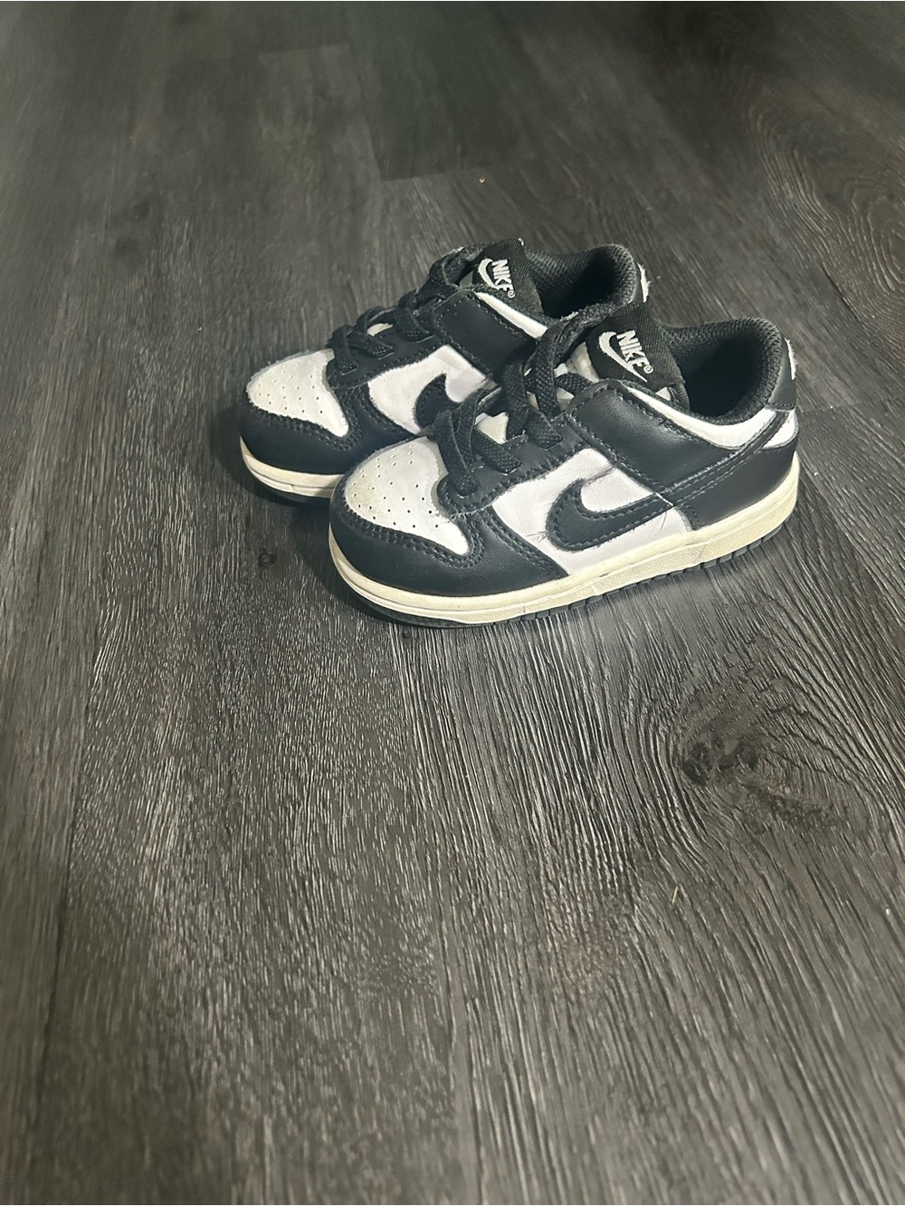 Nike Kids Black and White Low-Top Sneakers with Swoosh Accent
